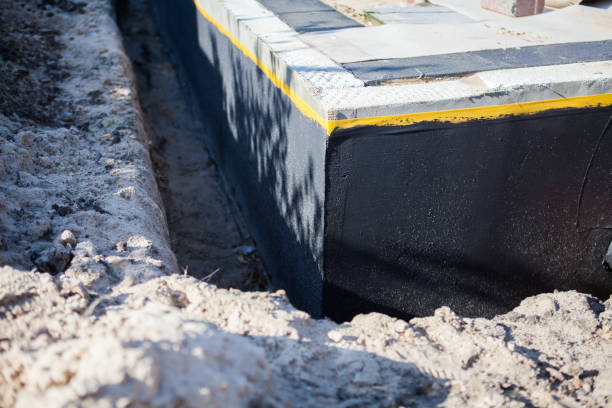 Professional Waterproofing technician working in Richmond, IN